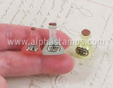 Pink Resin Flask with Frog Warts Label