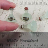 Aqua Resin Flask with Beetles Label