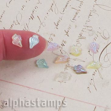 Tiny Iridescent Resin Conch Shells