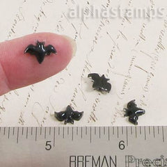 Tiny Black Resin Bats