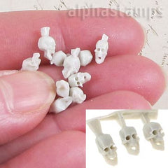 Tiny Cast Plastic Skulls