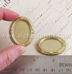 Set of Gold Oval Frames*