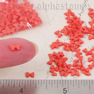Tiny Red Polymer Clay Bows*