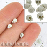 Tiny Cast Plastic Skulls